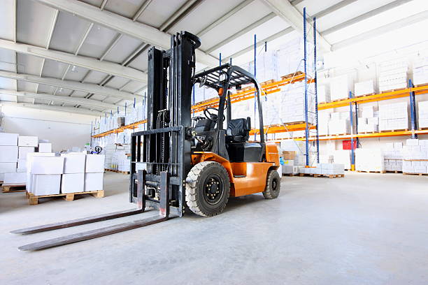 forklift in warehouse. forklift in warehouse.